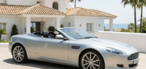 British expat standing next to a luxury car after securing premium car insurance in Marbella