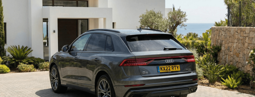 British car with UK number plates parked at a villa in Marbella.