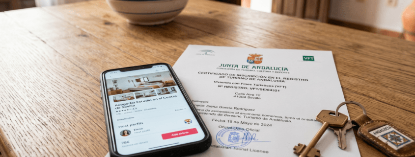 Andalusian tourist license document and keys for a Spanish holiday le