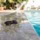 Slippery wet tiles next to a swimming pool in a Spanish villa.