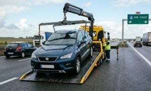 Car breakdown recovery truck on a European motorway.