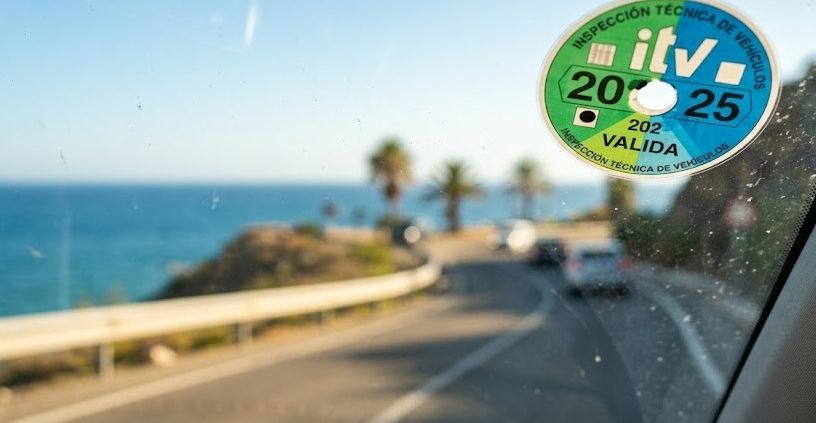 Spanish ITV sticker on a car windshield in Andalucia.